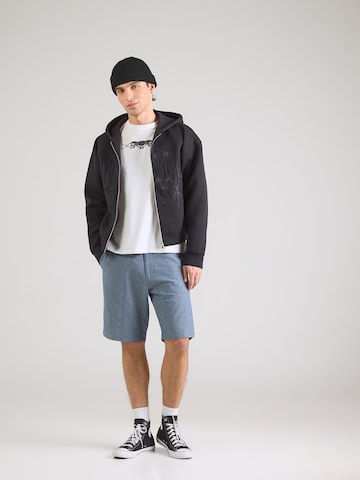 Iriedaily Szabványos Chino nadrág 'Golfer Chambray' - kék