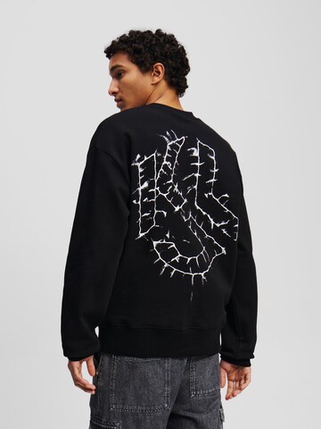 KARL LAGERFELD JEANS Sweatshirt i svart: framsida