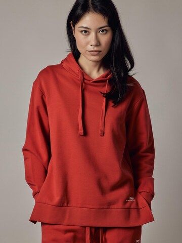 Felpa 'Felpa Felpata con Cappuccio e Spacchi Laterali' di OWN Off With Nature in rosso: frontale