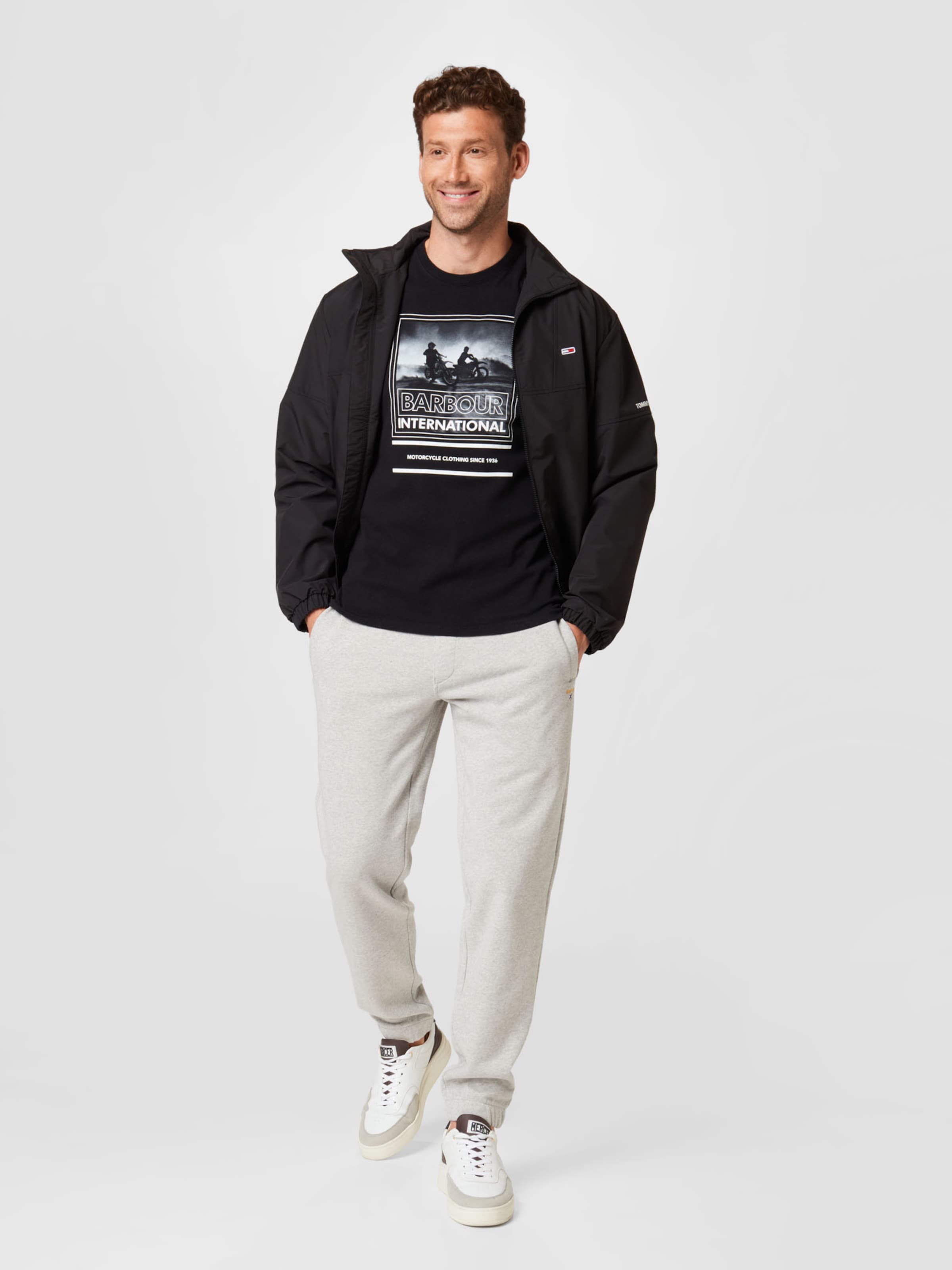 Männer Jacken Tommy Jeans Jacke in Schwarz - UI63481 Männer Jacken Tommy Jeans Jacke in Schwarz - UI63481