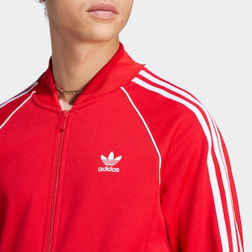 ADIDAS ORIGINALS - Casaco em moletão 'Adicolor Classics Sst' em vermelho