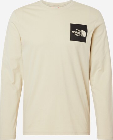 THE NORTH FACE - Camiseta en gris: frente