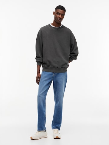 Tommy Jeans Collegepaita värissä musta