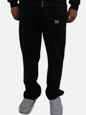 HEFTYKA Loosefit Sporthose 'OPEN LEG JOGGER'‌ in Schwarz