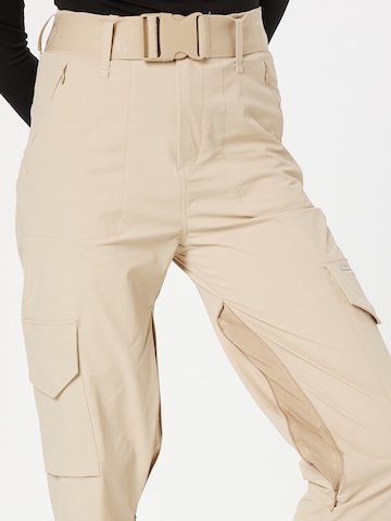 aim'n Tapered Sportbroek in Beige