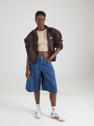 auksinė ADIDAS ORIGINALS Demisezoninė striukė 'ESS WB'