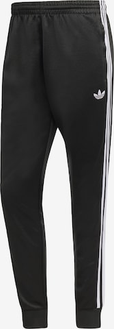 Pantalon 'SST' ADIDAS ORIGINALS en noir : devant