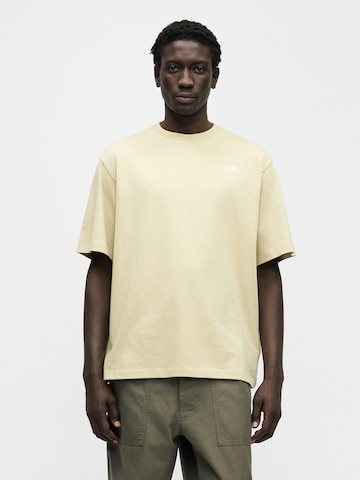 THE NORTH FACE Bluser & t-shirts 'ESSENTIAL' i gul: forside