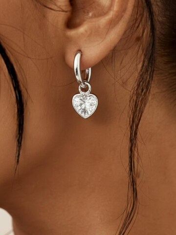 Boucles d'oreilles 'Silberne Creolen mit Hängendem Herz und Zirkonia' Maxte en argent