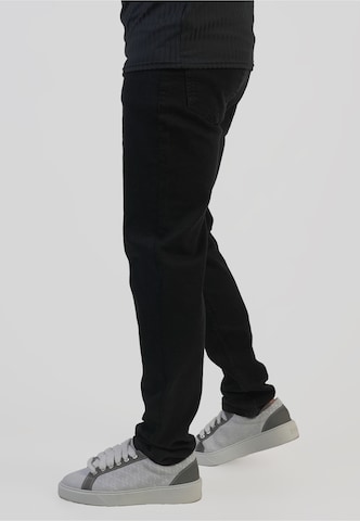 Coupe slim Jean SikSilk en noir