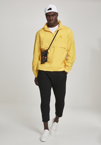 Veste mi-saison Urban Classics en jaune