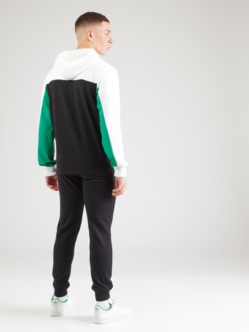 Tuta da jogging di Champion Authentic Athletic Apparel in bianco