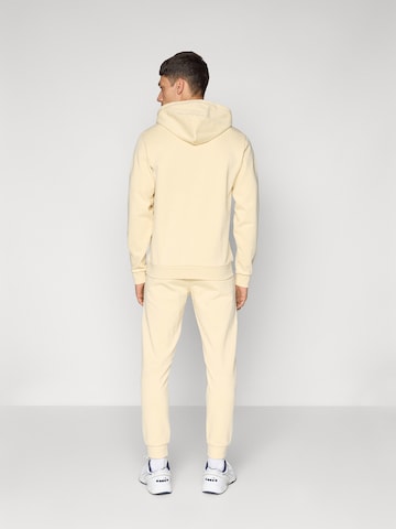 Regular Pantaloni sport 'BOLD 025' de la Sergio Tacchini pe bej: spate