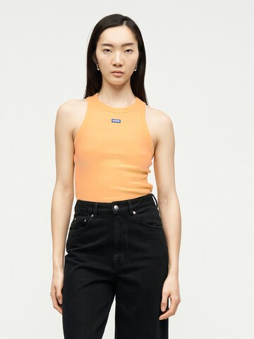 Haut HUGO en orange : devant