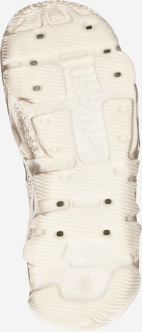 Nike Sportswear - Zapatillas sin cordones 'ISPA Universal' en beige