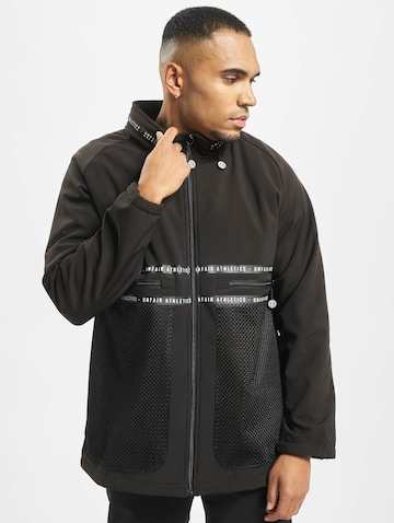 Unfair Athletics Between-Season Jacket in Black: front