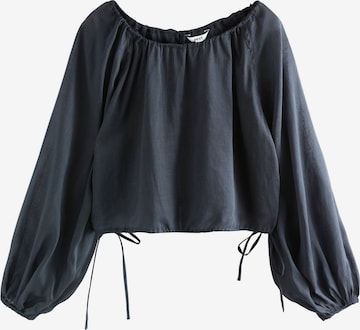 Next Pusero värissä sininen: etupuoli