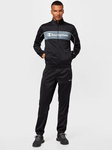 Champion Authentic Athletic Apparel Tracksuit in Black: front