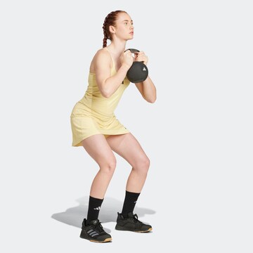 Top sportivo 'OPTIME' di ADIDAS PERFORMANCE in giallo
