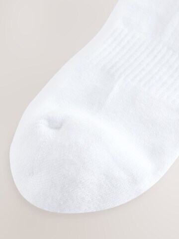 Next Sockor i vit