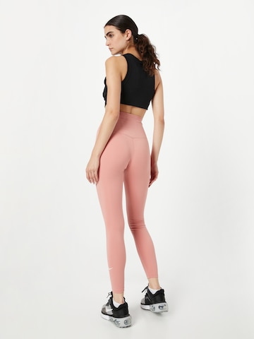 Skinny Pantalon de sport 'One' NIKE en rouge