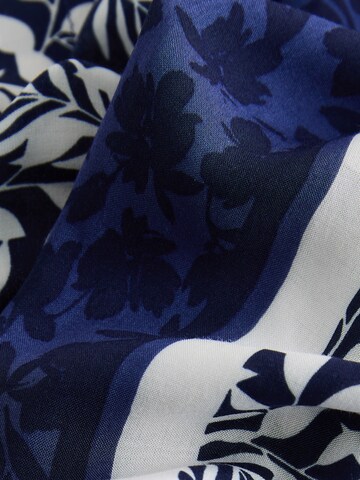 Next - Capa en azul