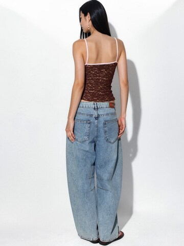 Top di Busem in marrone