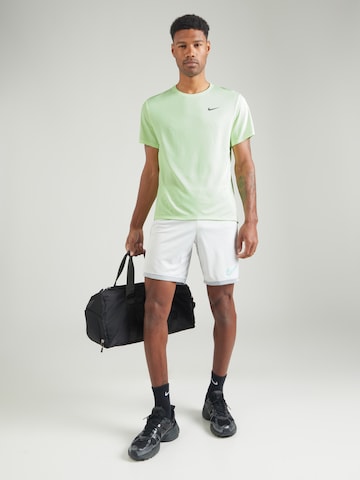 NIKE Performance Shirt 'MILER' in Green