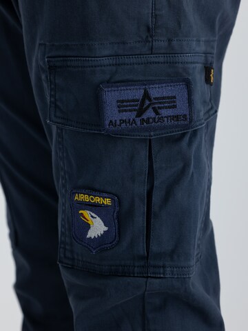 ALPHA INDUSTRIES Tapered Παντελόνι cargo σε μπλε