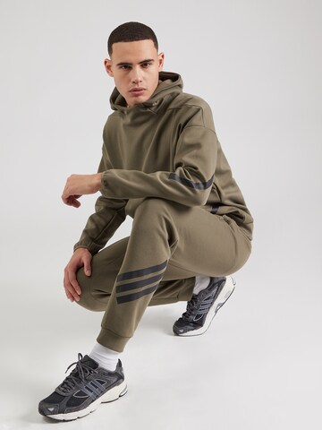ADIDAS SPORTSWEAR Tapered Sports trousers in Green