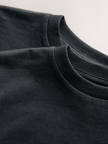T-Shirt Next en noir