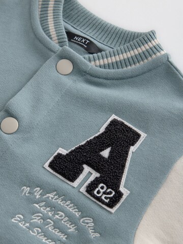 Next Tussenjas in Blauw