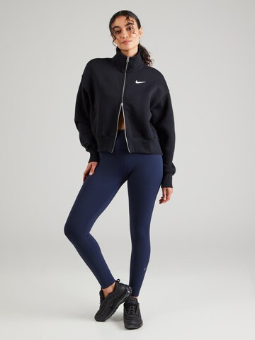Skinny Pantaloni sportivi 'ONE' di NIKE in blu