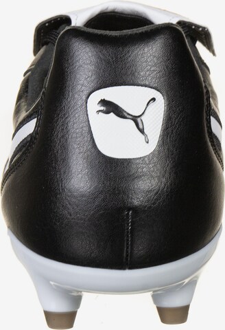 Chaussure de foot 'King Top FG' PUMA en noir