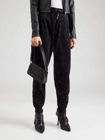 Juicy Couture Tapered Housut värissä musta: etupuoli
