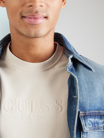 GUESS - Sudadera en beige