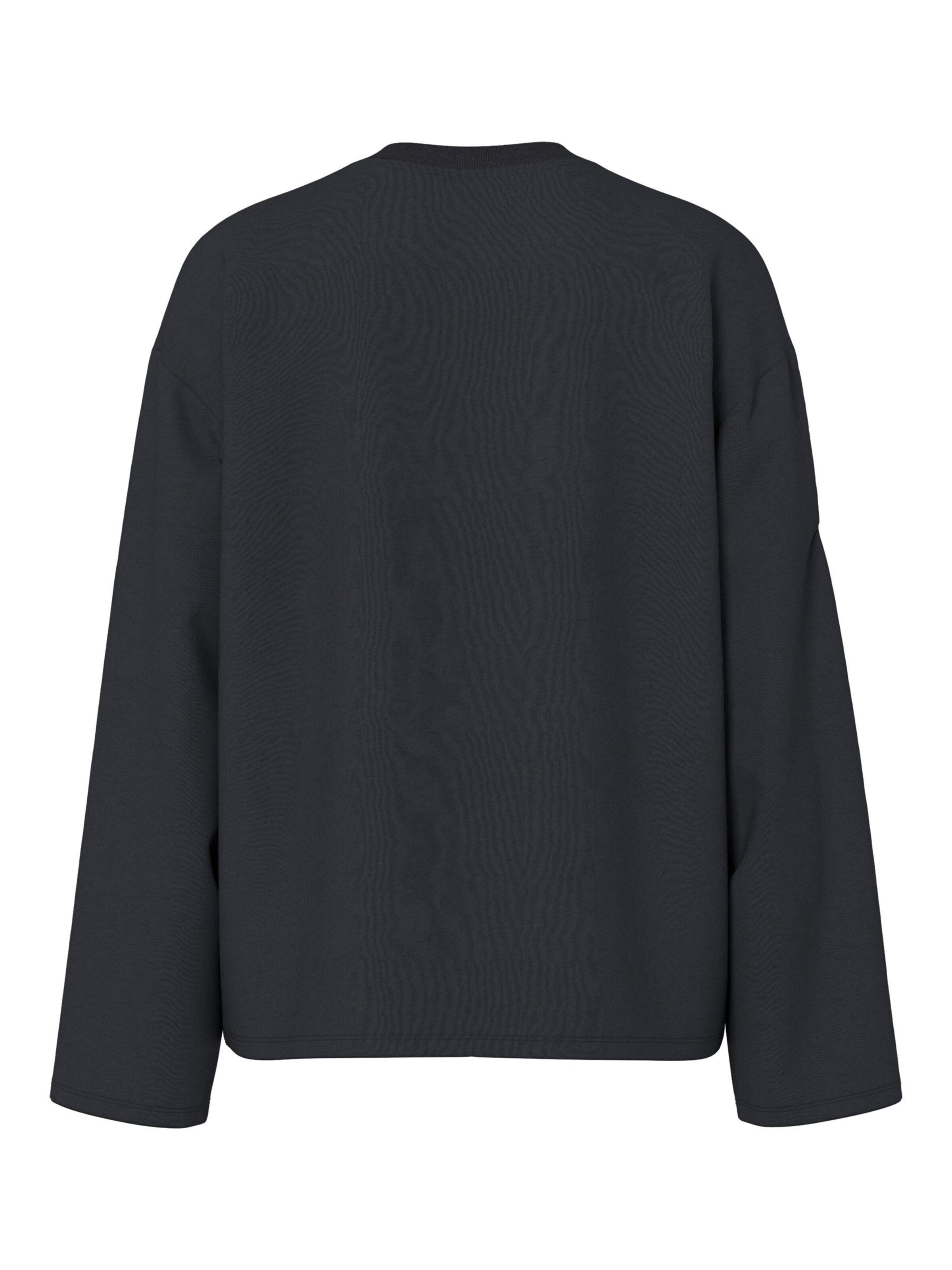 PIECES - Camiseta 'Sadie' en negro