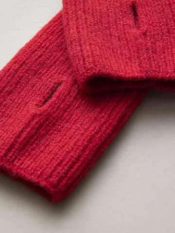Scaldapolsi di Next in rosso