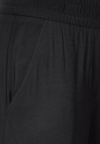 CECIL - Perna larga Calças 'Neele' em preto