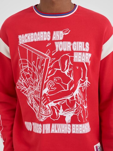 AND1 Bluzka sportowa w kolorze czerwony