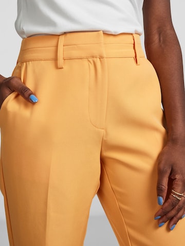 Y.A.S Flared Pleated Pants 'BLURIS' in Orange