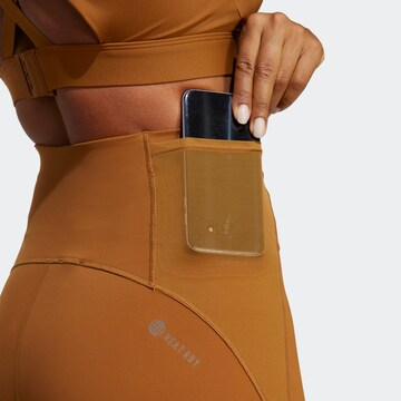 Skinny Pantaloni sportivi 'Tailored Hiit' di ADIDAS PERFORMANCE in marrone
