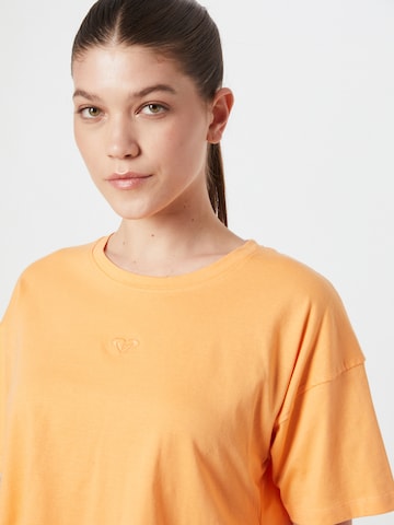 Maglia funzionale di ROXY in arancione