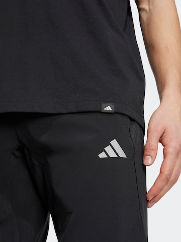 ADIDAS PERFORMANCE - Camiseta funcional en negro