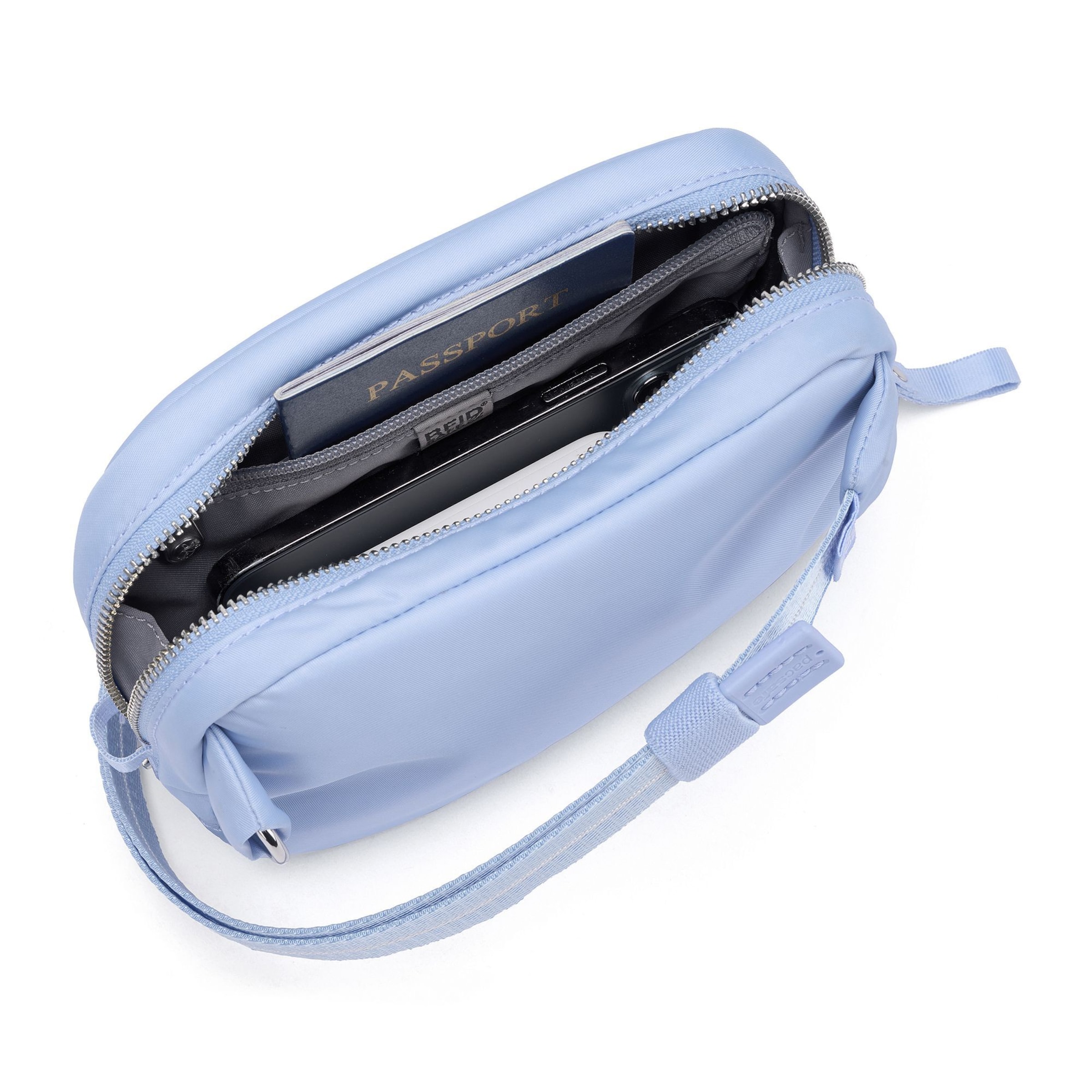 Sac à bandoulière Pacsafe en bleu