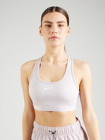 NIKE Bustier Biustonosz sportowy 'SWOOSH' w kolorze fioletowy: przód