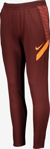 NIKE Workout Pants in Brown: front