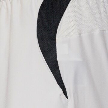 NIKE Regular Workout Pants 'Total90' in White