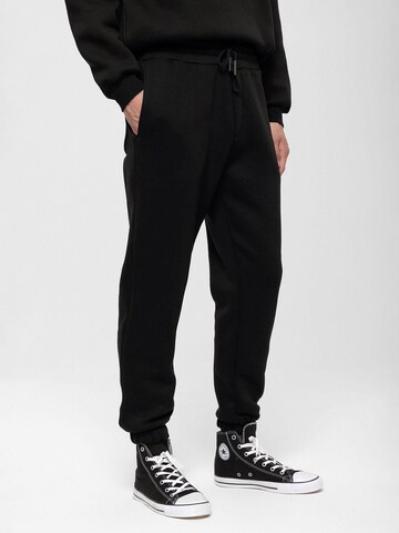 Antioch Tapered Trousers in Black