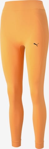 PUMA - Skinny Calças de desporto 'STUDIO FOUNDATIONS' em laranja: frente